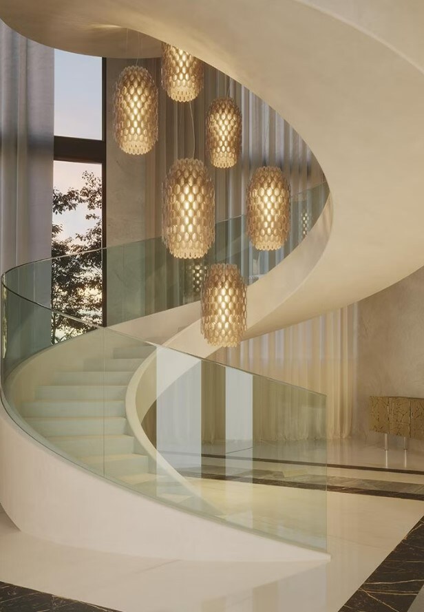 Zylindrische Hängelampe mit gestuftem Design, bestehend aus wabenförmigen Paneelen, die einen diffusen Lichteffekt erzeugen, aufgehängt an einem dünnen Draht.