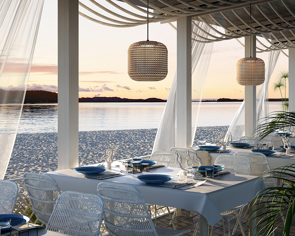 Eine zylindrische Hängeleuchte mit einem durchbrochenen, gemusterten Schirm, an einem schlanken Kabel befestigt.